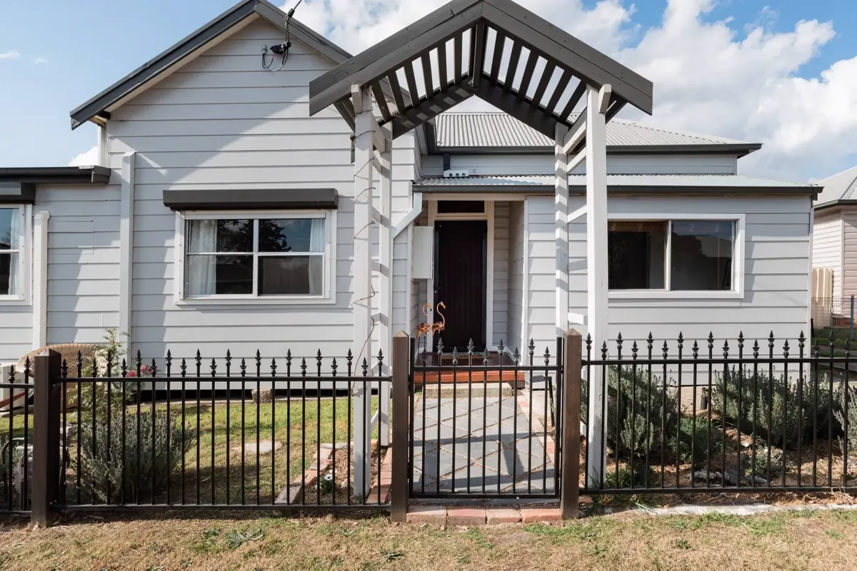 Exterior of Flamingo House, a restored miner’s cottage in Cessnock, Hunter Valley